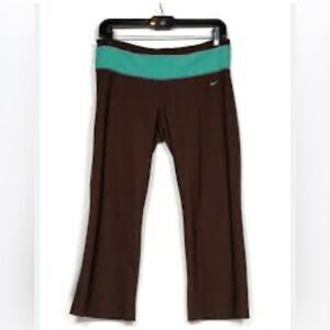 Nike Capris Dri-FIT technology (cool and dry )
 Nike logo green insert-small​